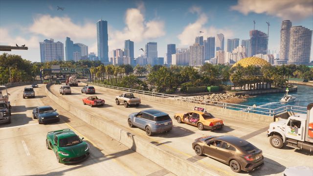 Traffic on a busy Leonida highway, with the Vice City skyline and a gold-domed building behind it